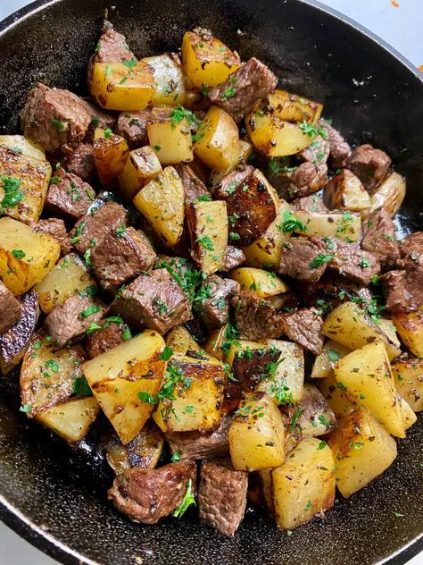 ```htmlSkillet Garlic Butter Herb Steak and Potatoes is the perfect dish for any steak lover. Imagine juicy, tender steak bites paired with perfectly seasoned potatoes, all enveloped in a rich garlic herb butter. This dish brings comfort and flavor together in one skillet, making it an absolute must-try!Why You’ll Love This RecipeIf you're a fan of steak and potatoes, this recipe will quickly become a favorite. It's easy to prepare, requiring just one skillet, and the flavors are out of this ... Crockpot Garlic Butter Steak, Garlic Butter Steak Potatoes, Garlic Butter Steak And Potatoes, Butter Steak And Potatoes, Butter Herb, Potatoes Skillet, Steak And Potatoes, Garlic Steak, Steak Potatoes