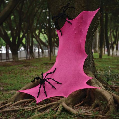 Skip the white webbing all your neighbors use for this truly unique Halloween decoration. The bright pink spiderweb can be stretched to fit your haunted house decor or front yard cemetery scene. pbBright Pink Stretchy Fabric Spiderweb product details:-b-p ul li2.1ft wide x 6ft tall-li liSuitable for indoor or outdoor use-li liSimple assembly required-li li100% polyester-li -ul Pink Halloween Decorations, Pink Spiderweb, Pink Halloween Decor, Homecoming 2024, Unique Halloween Decorations, Pink Glamour, Spider Web Decoration, Fruit Cakes, Halloween Spider Web