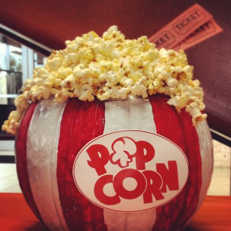 Pumpkin Decorating Contest idea- Popcorn theme.  Rules: no carving, family friendly. Paint red and white stripes on pumpkin, pop plain popcorn, hot glue popcorn to top, print sign and hot glue to front, hot glue movie tickets - by Jenn Russell Popcorn Pumpkin, Popcorn Theme, Creative Pumpkin Decorating, Pumpkin Carving Contest, Pumpkin Decorating Contest, No Carve Pumpkin Decorating, Pumpkin Contest, Pumpkin Topiary, Labu Halloween