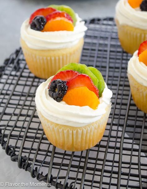 Fruit Tart Vanilla Cupcakes are light vanilla cupcakes filled with pastry cream and topped with fresh fruit and whipped cream topping.  They're the ultimate spring dessert! @cloverstornetta Fruit And Whipped Cream, Cupcakes Fruit, Whipped Cream Topping, Fresh Fruit Tart, Fruit Cupcakes, Fresh Fruit Cake, Cupcakes Filled, Summer Cupcakes, Patisserie Design