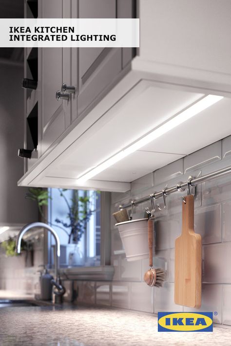 Late-night snacking just got easier with integrated kitchen lighting! The IKEA URSHULT lamp provides a small, focused beam of light, so you can spend time in your kitchen without turning on all the lights. Click to see more integrated lighting ideas! Apartment Kitchens, Integrated Kitchen, Integrated Lighting, Storage Wall, Design Remodel, Kitchen Redo, Ikea Kitchen, Storage Design, Unique Kitchen