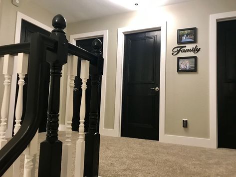 This is our upstairs hallway! Revere Pewter paint color and black doors with chunky white trim!!!! Love love this combo Black Doors Hallway White Trim, Black Doors Upstairs, Black Door Hallway, Black Doors White Trim, Pewter Paint Color, Black Doors With White Trim, Revere Pewter Paint, Hallway Upstairs, Trim Windows