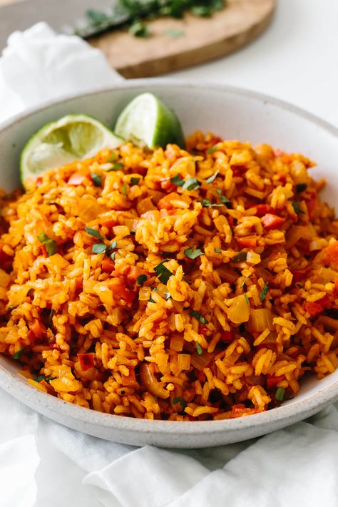 This easy Mexican rice recipe turns your basic white rice into a vibrant and flavorful side dish. Downshiftology Recipes, Easy Mexican Rice, Mexican Rice Recipe, Rice Recipe Easy, Mexican Rice Easy, Restaurant Style Recipes, Healthy Mexican Recipes, Mexican Rice Recipes, Rice Recipes For Dinner