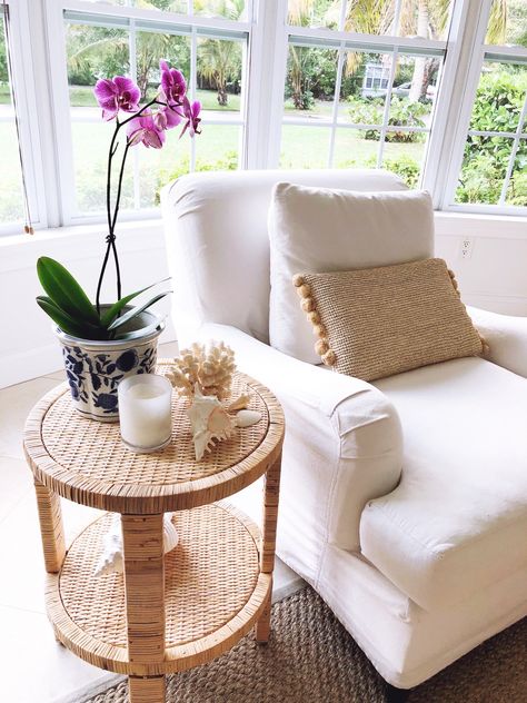 MAY FAVORITES- white slipcover sofa and rattan side table White Slipcover Sofa, Boho Side Table, Cubicle Makeover, White Slipcovers, Modern Coastal Home, Farmhouse Side Table, Rattan Side Table, Home Decor Colors, Side Tables Bedroom