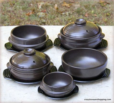 Beautiful Korean stoneware made from fine clay can elevate your dining expereince at home.  You can purchase the stoneware at http://crazykoreanshopping.com/stone-bowl.  The Bibimbap Bowl is great not only for sizzling dolsot (stone bowl) bibimbap but also any soup (Tang’s) dishes such as spicy pork bone soup (Gam Ja Tang), beef short rib soup (Gal Bi Tang) and ginseng chicken soup (Sam Gye Tang). Korean Stone Bowl, Korean Kitchen Gadgets, Korean Plates And Bowls, Korean Dishware, Korean Dinnerware, Korean Kitchenware, Beef Short Rib Soup, Korean Cookware, Short Rib Soup