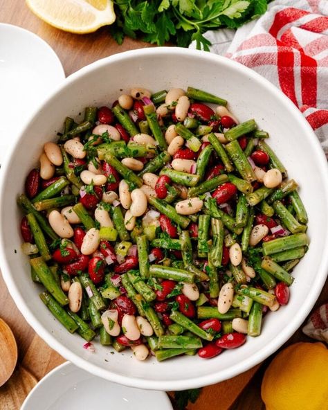 Three Bean Salad combines fresh green beans, creamy red and white beans, and a tangy vinaigrette for a perfect, quick, and healthy side dish! Its vibrant flavors and crunchy texture make it a favorite at potlucks, family parties, or as a light lunch. Plus, it’s packed with protein and fiber, making it as nutritious as it is tasty. Comment RECIPE down below to have it sent to you! Kidney Bean Salad, Green Bean Salad Recipes, Blanching Green Beans, Salads For A Crowd, Three Bean Salad, Side Dishes For Chicken, Healthy Side Dish, Green Bean Salads, Bean Salad Recipes