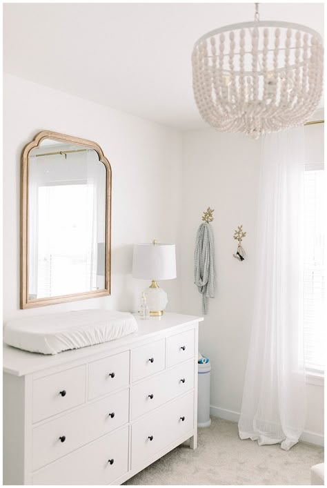 Mirror In Nursery Girl, Nursery Dresser With Mirror, Nursery Hooks Decor, Baby Nursery Mirror, Nursery Dresser Mirror, Hooks In Nursery, Changing Table With Mirror, Nursery Mirror Over Changing Table, Nursery With Bed