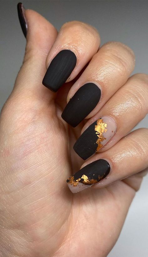 42. Matte Black Nails So if you’re looking for some inspiration as we head into 2021, we’ve curated the most of-the-moment nail art trends... Mate Black Nails With Glitter, Matte Nails With Foil Design, Matte Nails With Gold Flakes, Short Matte Nail Designs Fall, Matte Black And Gold Nail Ideas, Black Nail Matte, Black Nails With Foil, Black Nails With Gold Flakes, Short Matte Nail Designs