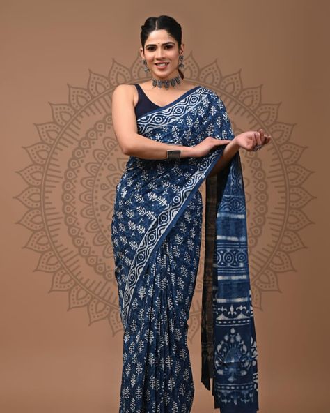 Indigo Summer Collection ☘️ Bagru Hand Block Printed Indigo Mulmul Cotton Saree With Blouse Step into the world of elegance and beauty with our stunning Mulmul Saree, handcrafted with love and care by skilled artisans in Bagru, Rajasthan. This saree is a true masterpiece, with a mesmerizing pattern of botanical motifs forming the magnificent design that looks absolutely breathtaking. Crafted from the finest quality mulmul cotton fabric, this saree is a symbol of traditional Indian textile... Mulmul Saree, Stitched Saree, Blouse Stitching, Cotton Saree Designs, Block Print Saree, Print Saree, Indian Textiles, Blouse Material, Fabric Pattern