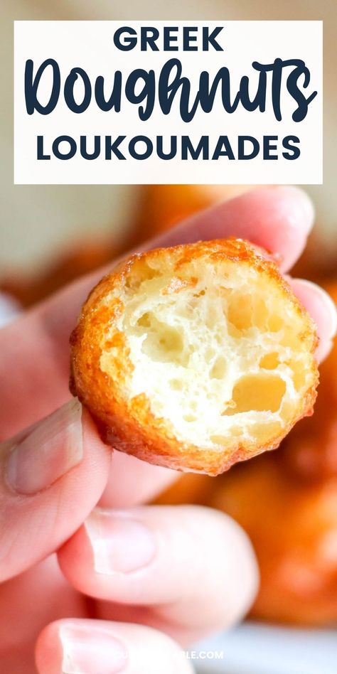 fried greek doughnut in a hand with one bite taken Loukamades Recipe, Mandolin Cookies, Greek Doughnut, Greek Desserts Easy, Greek Loukoumades Recipe, Loukoumades Recipe, Greek Deserts, Greek Donuts, European Desserts