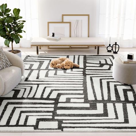 California Casual Home Decor, Black Grey Gold Living Room, Rug Under Couch Placement, Long Coffee Table Decor, African Modern Home Decor, Afrohemian Decor Living Room, Art Deco Rugs Living Rooms, Urban Living Room Decor, Size Rug For Living Room