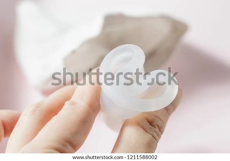 Close Woman Hand Folding Menstrual Cup Stock Photo (Edit Now) 1211588002 Woman Hand, Menstrual Cup, Womens Health, Photo Editing, Photo Image, Royalty Free Stock Photos, Stock Photos, Illustrations