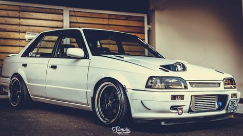 Mazda 323 Modified, Mazda 323 Sedan, Retro Racing Car, Customized Cars, Mazda 323, Mazda Cars, Street Racing, Japan Cars, Bike Rack