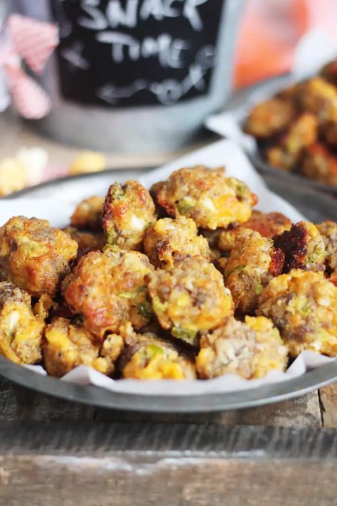 Made with spicy pickled jalapenos, savory cheddar and mild sausage, these Jalapeno Cheddar Sausage Balls will be a hit at your next party. Easy to make and so addictive, everyone will want your recipe for these. #sausageballs Cheddar Sausage Balls, Jalapeno Cheddar Sausage, Best Sausage Ball Recipe, Sausage Ball, Sausage Cheese Balls, Cream Cheese Sausage Balls, Sausage Balls Recipe, Spicy Appetizers, Best Sausage