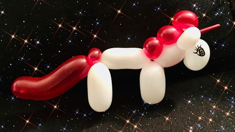 A red and white unicorn balloon with a black background, surrounded by stars. Easy Balloon Animals Step By Step, Ballon Animals Step By Step Easy, Balloon Animals Easy Step By Step, Easy Balloon Animals, Balloon Unicorn, Make A Unicorn, Party Ideas Kids, Twisting Balloons, Unicorn Pin