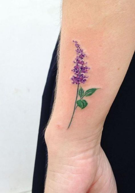 40 Lilac Tattoos: A Blossoming Expression of Individuality | Art and Design Lilocks Flower Tattoo, Small Lilac Tattoo, Lilac Flower Tattoo, Individuality Art, Lilac Tattoos, Purple Flower Tattoo, Discworld Tattoo, Tsunami Tattoo, Purple Flower Tattoos