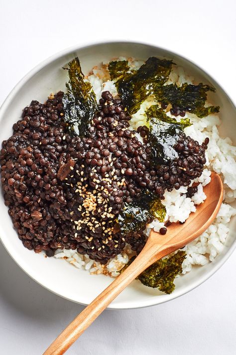 Inspired by kongjaban, a popular Korean banchan of sweet and salty black soybeans, this dish instead uses black Beluga lentils, which have a remarkable ability to hold their shape, even when fully tender. Braising them in soy sauce and garlic flavors them from the inside out, while the sugar and agave bring an enticing gloss and mild sweetness. French green lentils (like Le Puy) would also work great. French Green Lentils, Black Lentils, Seaweed Snacks, Soy Recipes, Green Lentils, Lentil Recipes, Sweet And Salty, Bon Appetit, Lentils