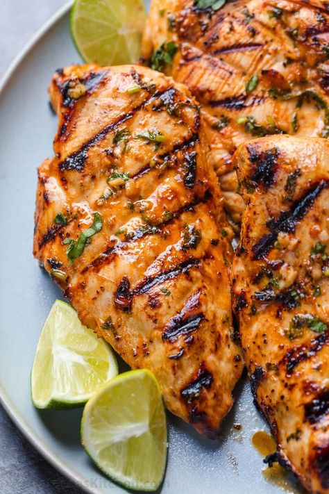 An EASY recipe for grilled Cilantro Lime Chicken, with a 5-minute prep time. The cilantro lime chicken marinade makes juicy, tender chicken. Grilled Cilantro Lime Chicken, Cilantro Lime Chicken Marinade, Summer Grilled Chicken, Lime Marinade For Chicken, Lime Chicken Recipes, Cilantro Chicken, Cilantro Lime Chicken, Grilled Chicken Recipes, Lime Chicken