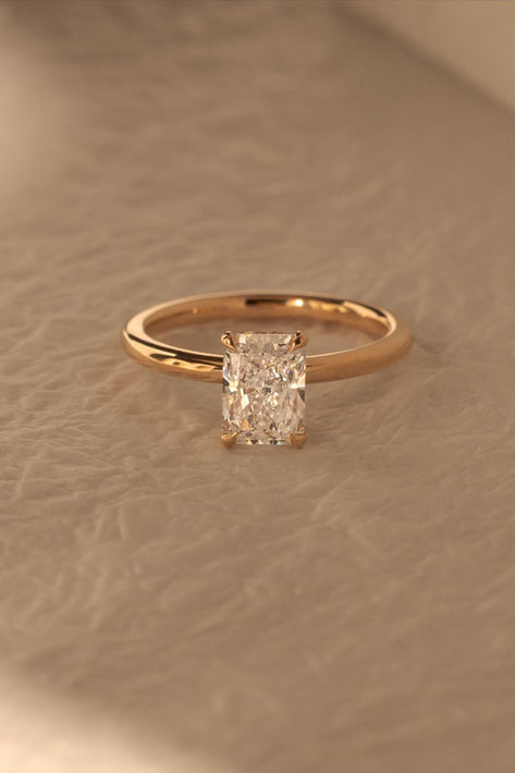 Dazzling in simplicity, this radiant solitaire engagement ring steals the spotlight with its hidden halo, adding the perfect touch of magic to the promise of forever 💍⁠ ⁠Ring Details:⁠ Liberty Radiant Solitaire⁠ Lab Grown Diamond⁠ 1.91ct | F | VS2⁠ 18k Rose Gold engagement ring ideas engagement rings simple engagement ring set engagement ring designs lab diamond engagement ring solitaire engagement ring rose gold rings rose gold ring engagement Diamond Promise Rings Simple, Wedding Rings Simple Gold Band, Solitare Diamond Rings, Thing Gold Band Engagement Ring, Simple Engagement Rings 2 Ct, Simple Gold Ring Engagement, Golden Band Engagement Rings, Rings Engagement Timeless, Elegant Engagement Rings Classy Gold