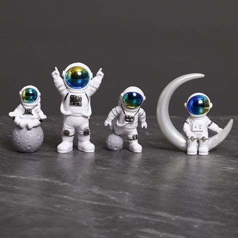 PRICES MAY VARY. 【Astronaut Toy】Kids are interested in outer space and dream of becoming an astronaut! The mini astronaut statue will attract kid's attention, stimulate their creativity and imagination to explore and learn more about the planets 【Premium Materials】LUOZZY Astronaut Cake Topper is made of high quality PVC solid plastic with excellent craftsmanship and three-dimensionality. Vivid and adorable, perfect for space birthday cake decorations 【Astronaut Figurines】Bring the wonder of oute Space Theme Party Decorations, Space Cake Topper, Mini Astronaut, Astronaut Cake, Space Cake, Astronaut Birthday, Space Theme Party, Outer Space Theme, Space Birthday Party