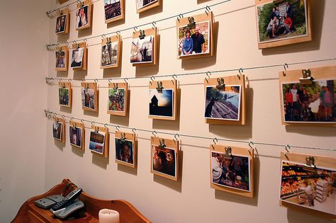 i'd do this with just the wire and string clothespins on it. i may or may not spray paint the clothes pins pretty colors too :) Photoboard Ideas, Decorate Ideas, Photo Wall Display, Exposition Photo, Hanging Artwork, Gallery Walls, Diy Photography, Hanging Photos, Picture Hanging