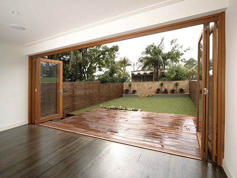 Bifold Doors Onto Decking, Timber Bifold Doors, Bifold Doors Onto Deck, Bi Folding Doors Kitchen, Bifold Door Ideas, Deck Doors, Hemp House, Living Room Sliding Doors, Wooden Patio Doors