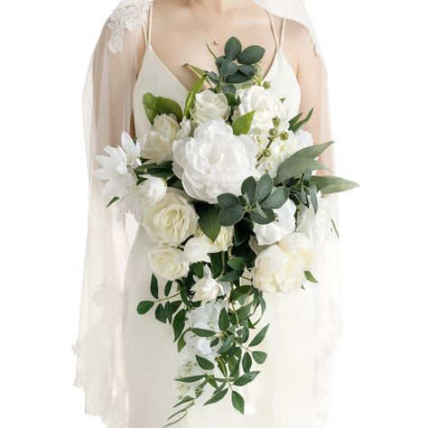 PRICES MAY VARY. Package: A 15" bridal bouquet with 3 ribbons wrapped on a card. Easy to add your bouquet ribbon warp style. Size: The bride bouquet is approx. 15" wide by 20" tall (Includes sagging greenery). The ribbons: 1.5" W x 5ft L for the white, ivory and nude. Material: Made of high-quality silk/foam flowers and silk greenery. Silk flowers include white peony, ivory Hydrangea, white vendela rose, white avalanche rose, ivory bridal flowers, ivory carnation, white Camellia,white Wisteria. Bridal Bouquet White With Greenery, White Cascading Bridal Bouquet, Bridal Bouquet Cascading, Vendela Rose, Camellia White, Ivory Hydrangea, Bouquets For Wedding, Avalanche Rose, Ivory Bouquet Wedding