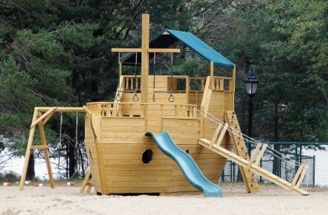 Old Forge added  pirate ship to the beach playground! Pirate Ship Playhouse, Kids Playhouse Plans, Swing Set Plans, Kids Playhouse Outdoors, Backyard Playset, Kids Backyard Playground, Playground Slide, Playhouse Plans, Backyard Playhouse