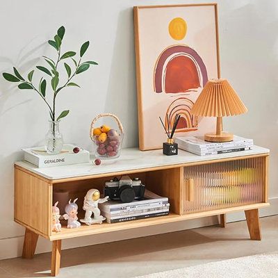 The TV stand is made of high-quality bamboo material. Its surface is smooth, healthy and environmentally friendly, durable and easy to clean, There are 4 solid bamboo supporting legs at the bottom, the structure is stable and not easy to deform. | George Oliver Kanedra Storage Credenza Wood in Brown | Wayfair Console Modern, Credenza Wood, Tv Console Cabinet, Cabinet For Living Room, Cool Tv Stands, Console Cabinet, Storage Credenza, Modern Console, Entertainment Centers