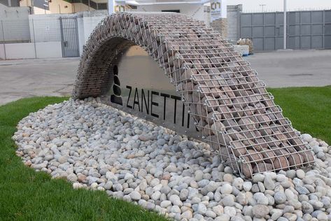 Gabions light: only one steel grid needed to keep a stack of stones in place next to a wall | Stone-ideas.com Neighborhood Signage, Stone Ideas, Gabion Wall, Facade Cladding, Fountains Outdoor, Block Wall, Truck Design, Stainless Steel Mesh, Fence Design