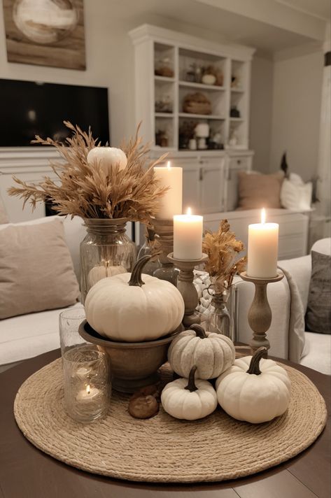 Neutral fall decor embraces earthy tones and natural textures. Think cozy beige throws, soft ivory pumpkins, rustic wooden accents, and subtle gold touches. It creates a warm, inviting atmosphere perfect for the season, blending seamlessly with any home style. #falldecor #falltabledecor #fall #falldecorations Beige Aesthetic House Decor, Earthy Tones Home Decor, Home Decor Ideas Gold Accents, Fall Decor Ideas For The Home Aesthetic, Designer Fall Decor, Neutral Color Fall Decor, Neutral Fall Home Decor Ideas, Fall Decor Ideas For The Home Neutral, Chic Fall Decor Living Room