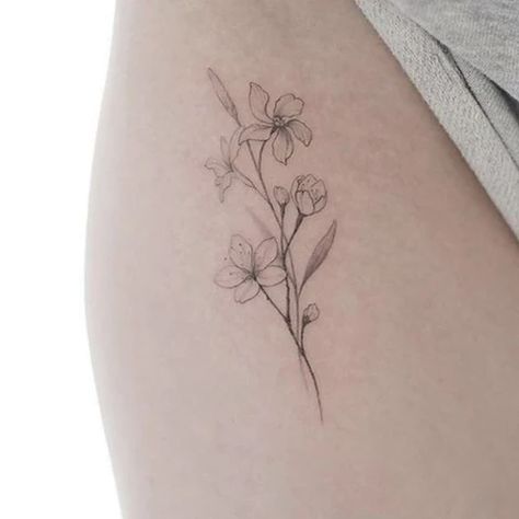 Birth Flower Tattoos: Tattoos For Every Birth Flower – MrInkwells Flower Tattoos Lily, Minimalist Tattoo Flower, Lilly Flower Tattoo, Jasmine Tattoo, Violet Flower Tattoos, Violet Tattoo, Lillies Tattoo, Lily Tattoo Design, Flower Reference