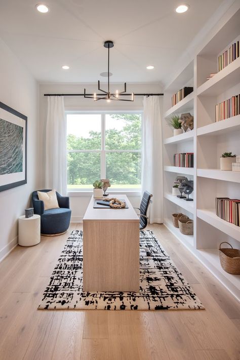 Bright and open home office with built-in shelving used for storage or as a bookshelf. Home Library Office, Mesa Home Office, Library Office, Home Office Layout, Cozy Home Office, Small Home Offices, Home Office Setup, Home Office Space, Home Library