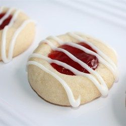 Raspberry and Almond Shortbread Thumbprints - Allrecipes.com. I only used powdered sugar and water for the drizzle glaze. I did not care for the almond extract in the drizzle so I omit it all together. Raspberry Thumbprint Cookies, Almond Shortbread, Raspberry Almond, Chocolate Crinkles, Thumbprint Cookies, Raspberry Jam, Cookie Desserts, Yummy Cookies, Holiday Baking