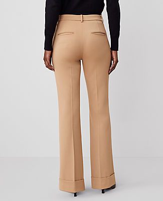 The versatile, streamlined look is back - our cuffed trouser pant is ultra flattering. Front zip with extended button tab closure. Front off-seam pockets. Back besom pockets.,Leg Shape:Leg Shape: Trouser – a pant with a bit of flare that lengthens legs,Rise:High rise: sits 1/2" to 1" below natural waist,Imported:Imported,Fit:Fit: Tailored & fitted,Length:Full length: 31 1/2" inseam with 22" leg opening,Fabrication:64% Polyester, 31% Viscose, 5% Elastane,Garment Care:Machine Washable The Cuffed Tab Waist Trouser by Ann Taylor Size regular - 18 Perfect Camel Women's Regular, Trouser, Pants, 64%, Polyester, 31%, Viscose, 5%, Elastane, Machine, Washable Flat Front Trousers Women, Women's Work Pants, Best Dress Pants For Women, Petite Work Pants, Casual Dress Pants Outfits, Work Pants Women Office Wear, Ann Taylor Outfits, Womens Pant Suits, Camel Pants Outfit