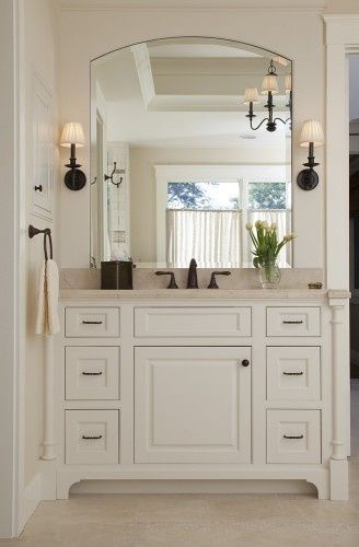 Arched mirror over built-in vanity Traditional Bathroom Designs, Bronze Fixtures, Farmhouse Bathroom Vanity, Double Sinks, Bad Inspiration, Subway Tiles, Bathroom Reno, Basement Bathroom, Trendy Bathroom