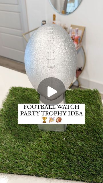 Shelby | Gift-in-a-Box Guide on Instagram: "We love a functional trophy (or hostess gift)  Predict the score and we’ll see if you’re right 😉🏈  #makeitwithmichaels #biggame #partyfavors #footballparty #michaelsstores #footballwatchparty #diy #howto #michaels #makeitwithmichaels #hostingideas #gameday #partyideas #easydiy #footballparty #diypartydecor #diyideas" Football Trophy Diy, Diy Super Bowl Trophy, Super Bowl Party Centerpieces, Diy Football Party Favors, Super Bowl Diy Decorations, Diy Football Trophy, Football Party Centerpieces Diy, Trophy Centerpiece Ideas, Football Coach Gift Ideas Diy