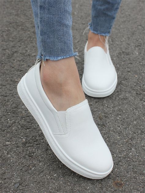 White slip on sneakers