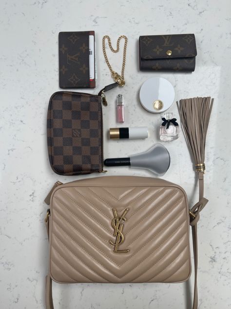 #yslbag #bag #camerabag #creambag #flatlay #flatlaystyle #pouch #cardholder #minipochette #keyholder #hermesbeauty #diorbeauty #diorama #perfume #bagspill #aesthetic #itgirl #inspiration #baglover #luxurybag #ysl #lv #fashion #essentials #everydaycarry #stylingwithkatt Ysl Camera Bag, Ysl Lou Camera Bag, Me Bag, Inside My Bag, Lv Fashion, Cream Bags, Flatlay Styling, Dior Beauty, Saint Laurent Bag