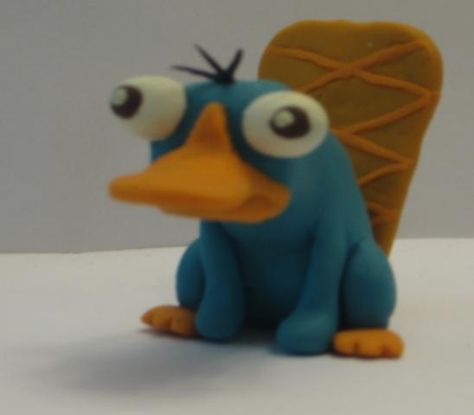 Clay Perry The Platypus, Polymer Clay Cartoon Characters, Perry The Platypus Clay, Clay Cartoon Characters, Clay Date Ideas, Futurama Poster, Clay Date, Easy Clay Sculptures, Perry The Platypus