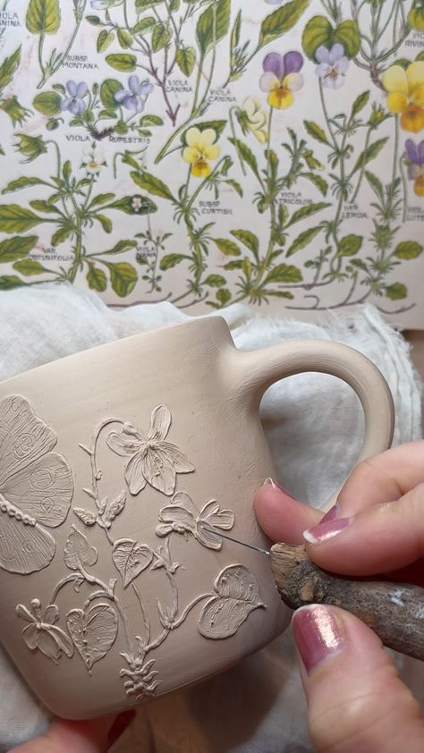 Painting clay slip on a dandelion vase waiting for a snow storm 🌨️ ✨ #handmadepottery #pottery #ceramics #handmade #handmadeceramics… | Instagram Pottery Ideas Gift, Slip Painting Pottery, Ceramic Slip Trailing, Slip Design Ceramics, Handmade Pottery Ideas Inspiration, Ceramic Slip Design, Dandelion Vase, Pottery Art Ideas, Slip Trailing Pottery