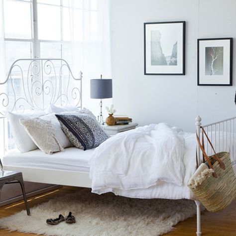 I have this Ikea bed. I love the idea of the textured rug underneath! Leirvik Bed, Ikea Bed Frames, Murphy Bed Ikea, Ikea Bedroom, Pinterest Contest, Ikea Bed, White Bed, The Everygirl, Up House