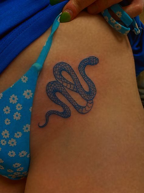 snake tattoo Snake V Line Tattoo, Tiny Snake Tattoo Hip, Snake Tattoos Hip, Snake On Hip Tattoo, Nagini Tattoo, Hip Snake Tattoo, Snake Tattoo On Hip, Delicate Snake Tattoo, Blue Snake Tattoo