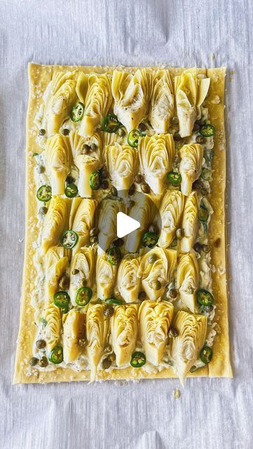 32K likes, 306 comments - carolinagelen on March 23, 2022: "ARTICHOKE TART - spring is here so this recipe deserves a repost: a delicate, flaky veggie tart is the perfect way to celebrate the season! It’s cheesy, fresh, veggie packed and so delicious✨  Recipe (6 servings)  1 puff pastry sheet, store-bought 1 egg, whisked A handful of finely chopped parsley  1 cup mozzarella cheese 1/2 cup ricotta cheese A heaping tablespoon crème fraiche or sour cream, or cream cheese A dozen artichoke hearts, j Artichoke Tart, Tarts Savory, Veggie Tart, Sliced Lemon, Shaved Parmesan, Cheese Tart, Tarte Fine, Serrano Pepper, Cheese Tarts