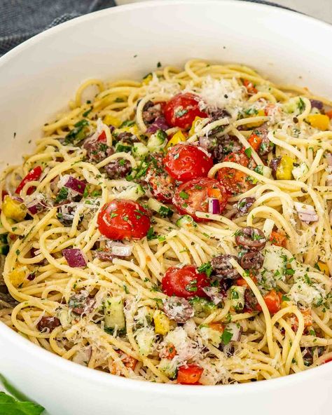 Looking for a fresh and easy dish? Try this California Spaghetti Salad! Packed with veggies and tossed in a zesty Italian dressing, it's perfect for any meal or gathering. #CaliforniaSpaghettiSalad #PastaSalad #FreshAndDelicious #EasyRecipes #HealthyEating #JoCooks California Spaghetti Salad Recipe, California Spaghetti Salad, California Spaghetti, Salad With Tomatoes, Spaghetti Salad, Sandwich Sides, Zesty Italian Dressing, Vegetarian Italian, Jo Cooks