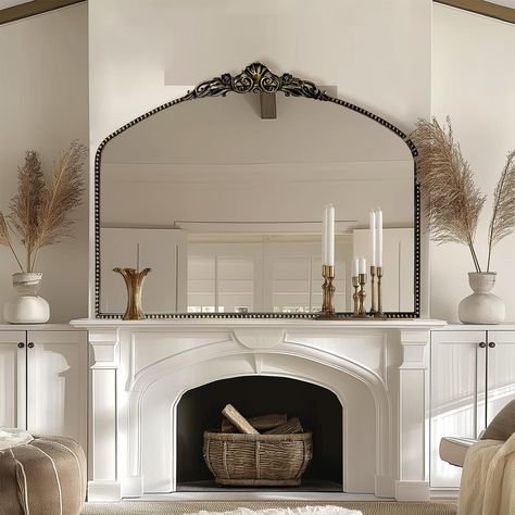 PRICES MAY VARY. Dimension - Antique Black Baroque Arched Mirror with frame 40"X31" Vintage Design - This stunning piece combines the vintage appeal of traditional design with an ornate baroque style, providing a timeless beauty that will seamlessly complement any décor. Barque Style- Its ornate design, antique black finish, and impeccable craftsmanship make it the perfect addition to any room. A statement piece that combines antique elegance with modern style. French country mirror will suitabl Vintage Mirror Above Fireplace, Mantle With Arched Mirror, Fireplace Lanterns Decor, Antique Mirror Fireplace, Vintage Arched Mirror, Large Mirror On Mantle, Above Mantel Wall Decor, Vintage Modern Fireplace Decor, Craftsman Mantle Decor