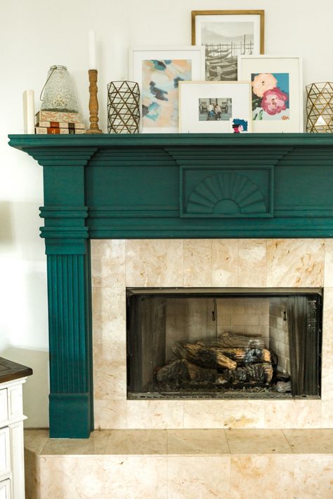 Green fireplace trim with art mantel decor in the living room/family room Light Green Fireplace, Green Mantel Fireplace, Colorful Fireplace Mantle, Emerald Green Fireplace, Painted Fireplace Mantels Color, Green Fireplace Mantle, Green Painted Fireplace, Green Living Room Fireplace, Colored Fireplace Painted