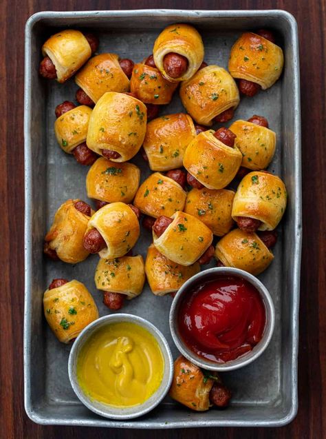 Pigs in a Blanket Recipe is cocktail-sized sausages wrapped in strips of a crescent roll dough, baked to a golden brown, and brushed with garlic butter. It's the perfect finger food to serve at your Christmas party! 49ers Food, Easy Pigs In A Blanket, Spicy Honey Mustard, Fall Finger Foods, Pigs In A Blanket Recipe, Sausage Wrap, Cocktail Sausages, I Heart Naptime, No 2 Pencil