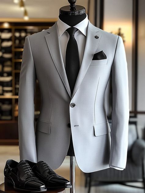 Make a lasting impression with our light gray suit. Visit our website to explore this classic look.   #TimelessStyle #Menswear #mensfashionwear#trustycoders #menstylepage #fashion #mensfashiontips #mensclothing #menaboutfashion #bespokesuit #bespoke #dapper #ootdmenstyle #mensstreetstyle Light Grey Suits Wedding, Light Grey Suit Men, Light Gray Suits, Masculine Contemporary, Light Gray Suit, Grey Mens Suit, Mens Outdoor Fashion, Gray Suits, Grey Suit Wedding