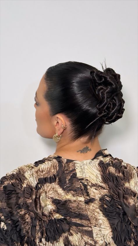 sleek hair, sleek bun, twisty bun, spiky bun, new york fashion week hairstyles, chignon, holiday hairstyles, party hairstyles, updo styles, updo for long hair, middle part bun, sleek middle part Middle Part Bun Sleek, Party Hairstyles Updo, Sleek Braided Bun, Slick Updo Hairstyles, Long Hair Middle Part, Middle Part Bun, Sleek Middle Part, Fashion Week Hairstyles, Twisty Bun